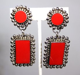 Contemporary Silver Tone Clip Earrings Having Red Opaque Stones