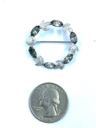 Sterling Silver Wreath Broock With Smoked Stones.