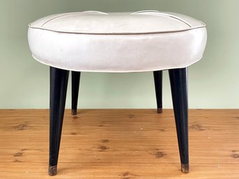 A Mid-century Round White Vinyl Footstool