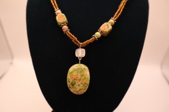 Green And Pink Stone Necklace With Tiny Amber Colored Beads And Silver Tone