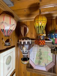 FOUR DECORATIVE METAL PAINTED BALLOONS, TWO HANGING, TWO MOUNTED