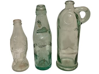 Vintage Bottle Collection Including A Late 1800s Glass Marble Stopper Soda Bottle, Pinched Coke Bottle &