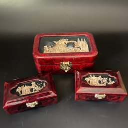A Set Of 3 Lacquered Boxes With Intricate Three Dimensional Art Work