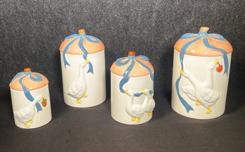 Set Of Four Ceramic Canisters Featuring Geese & Ribbon