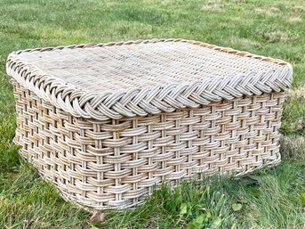 A Vintage Wicker Ottoman