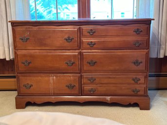 A Vintage Six Drawer Chest In A Traditional Style
