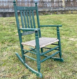 An Antique Slatted Back Porch Rocker