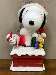 10.75 Inch Snoopy Santa Animated Musical Tablepiece