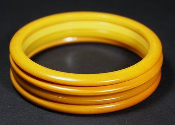 Four Butterscotch Bakelite Plastic Bangle Bracelets