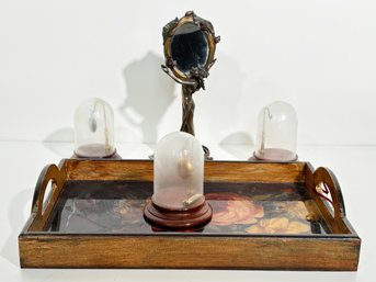 An Art Nouveau Bronze Mirror, Vanity Tray, And Pocket Watches Under Cloches