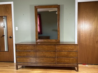 A Vintage Long Dresser With Attached Mirror & Chevron Patterned Veneer In Speckled Walnut Stain