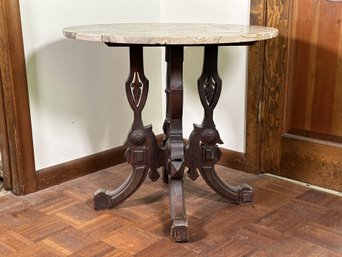 An Antique Victorian Table With A Gorgeous Stone Top