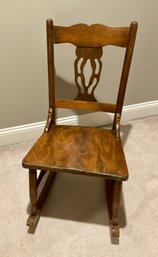 Antique Wooden Children's Rocking Chair