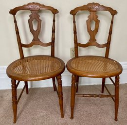 Pair Of Carved Oak Side Chairs With Cane Seats