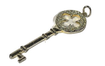 Sterling Silver Key Formed Pendant Having White Stones