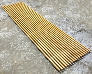 A Slatted Wood Wall Panel Or Bench/table Top