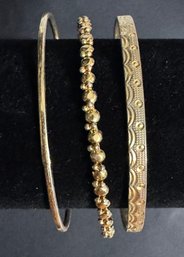 3 Gold Toned Bracelets