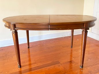 A Vintage Mahogany Extendable Dining Table By White Furniture