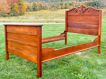 A Victorian Carved Oak Twin Bedstead