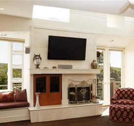 A Custom Limestone Mantle - Fireplace Surround With Stained Glass Storage Cubby - Primary