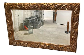 Large Beveled Mirror With Gilded Wood Frame And Floral Motifs