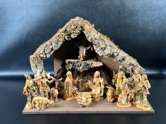 A Vintage Manger Scene With Molded Plastic Figures