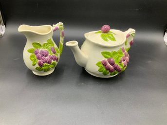 Teapot And Pitcher With Grape Decoration