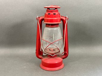 A Vintage Metal & Glass Lantern In Red