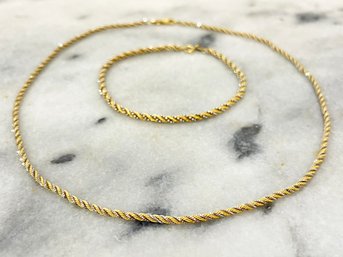 An 18K Gold Bracelet And Necklace Set