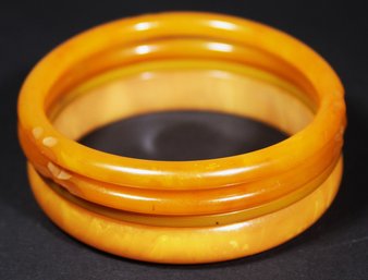 Lot Of Four Bakelite Plastic Butterscotch Bangle Bracelets