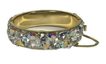 Vintage Aurora Borealis Rhinestone Hinged Cuff Bracelet Gold Tone