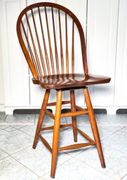 A Wooden Swivel Stool