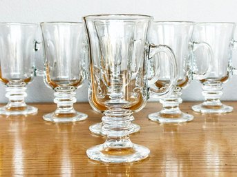 A Set Of Eight Fine Blown Glass, Coffee Mugs