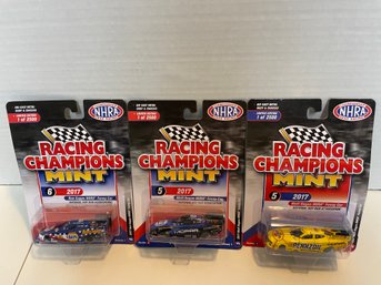 Racing Champion Mint Three  Racing Cars  Cast Cars.(#169)