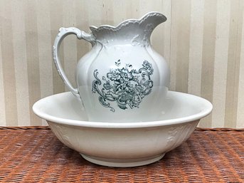 An Antique Wash Basin And Pitcher