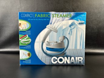 A Compact Fabric Steamer By Conair With Original Box