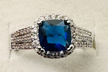 PRETTY SILVER TONE BLUE & WHITE CZ RING