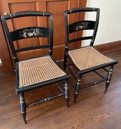 A Pair Of Beautiful Antique Painted Chairs With Stencil Designs And Caned Seats