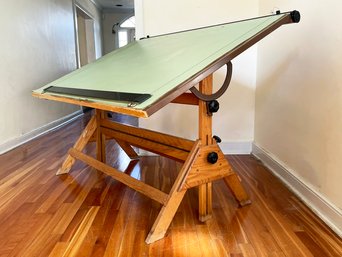 A Vintage Oak And Cast Iron Drafting Table