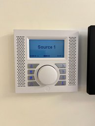 A GE Security Smart Connection Center With Assortment Of Devices