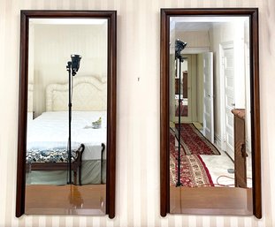 A Pair Of Vintage Beveled Mirrors In Wood Frames