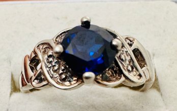 PRETTY SILVER TONE BLUE STONE RING