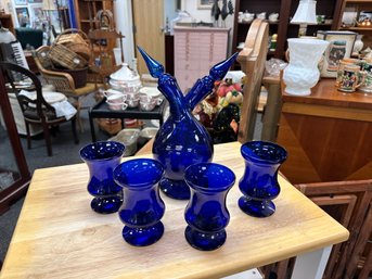 Blue Double Spouted Decanter And 4 Pedestal Glasses.