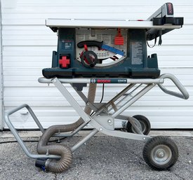 A Bosch Table Saw On Rolling Stand - With Blades, And More Accessories!