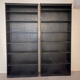 A Pair Of Wood Bookcases - Basement