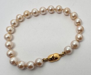 SIGNED MONET FAUX PEARL BRACELET GOLD TONE CLASP