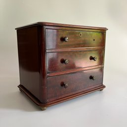 A Diminutive Three Drawer Wood Chest - Antique