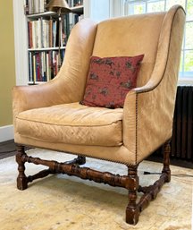 A Leather Arm Chair With Nailhead Trim