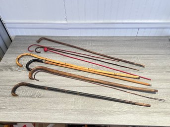 Assortment Of Walking Sticks And Carnival Canes