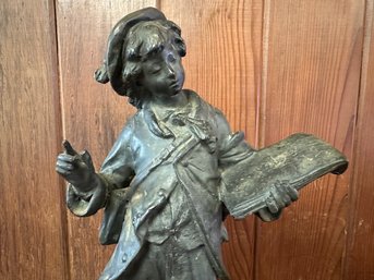 Bronze Statue Of A Messenger Holding Papers